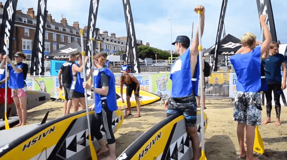Hundreds take part in the Weymouth Ecover Blue Mile, featuring the Naish ONE SUP Race Series - Naish.com
